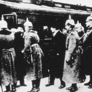 The Soviet delegation arrives at Brest-Litovsk. Lev Trotsky is in the center surrounded by German officers