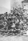 A detachment of worker Red Guards poses for a photograph before departing for the front. Photograph by Ia. Shteinberg