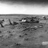 Buried machinery in a barn lot; Dallas, South Dakota, May 1936