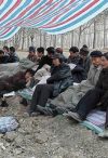 Migrant workers protest a construction contractor who refused to pay the their wages after completion of a project