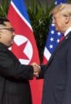 President Trump shakes hands with Kim Jong-un, June 12th 2018