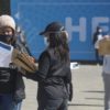 A volunteer checks information of a COVID-19 vaccine recipient at a vaccination site in Johannesburg, South Africa, Aug. 20, 2021