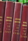 Photograph of journal bindings in an anthropology library, showing the transition where Eugenics Quarterly was renamed to Social Biology in 1969