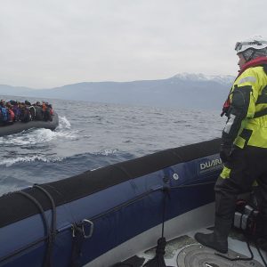 Refugees crossing the Mediterranean sea on a boat, heading from Turkish coast to the northeastern Greek island of Lesbos, 29 January 2016